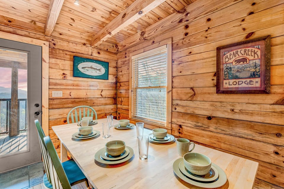 Enjoy your meals on our 10-seat dining table with a built in and pull-out benches. Our new hickory and alder wood dining table is not shown.