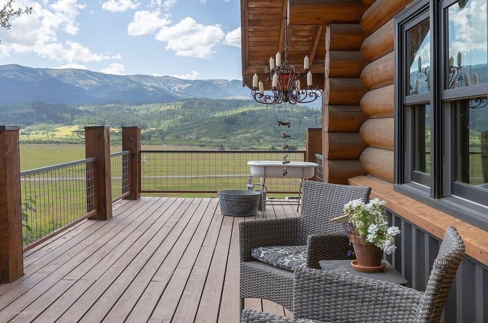 Relax on the large wrap around deck overlooking beautiful views.