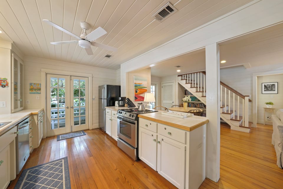 KITHCEN VIEW FACING DINING AND STAIRCASE