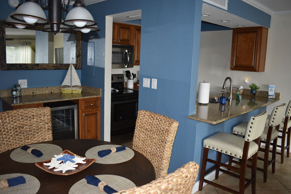 Kitchen with separate bar area with new beverage center