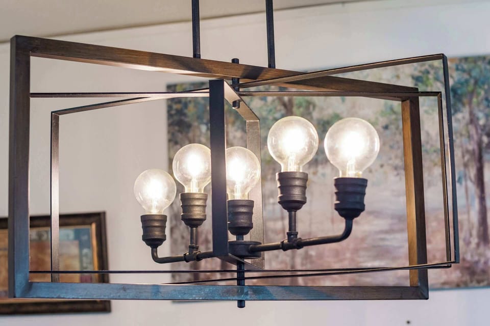 Stylish Details. Modern, rustic lighting sets the perfect atmosphere for your group meals. We take pride in the thoughtful touches that elevate your stay!