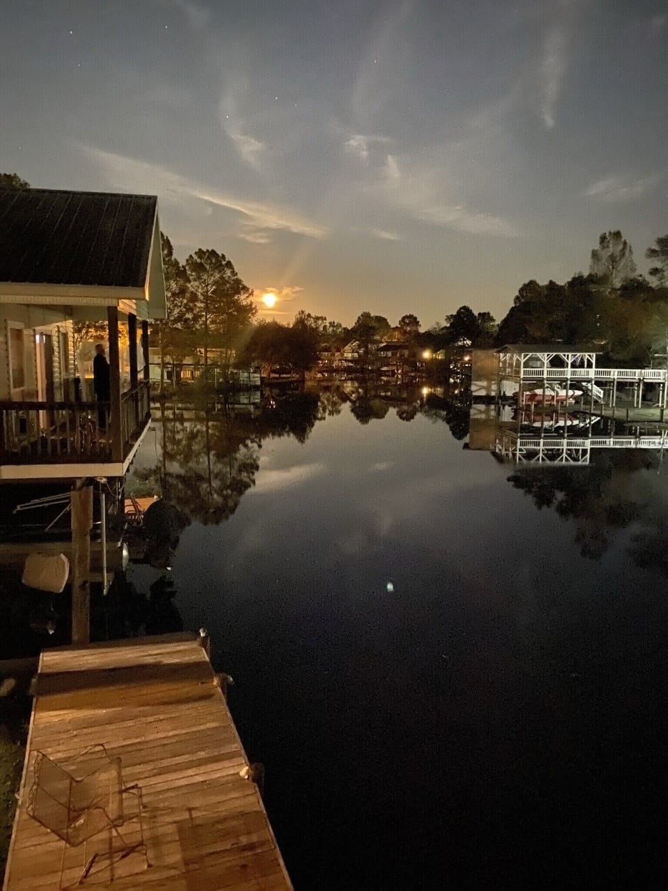 Enjoy this evening view from the screened in patio in our boathouse! 