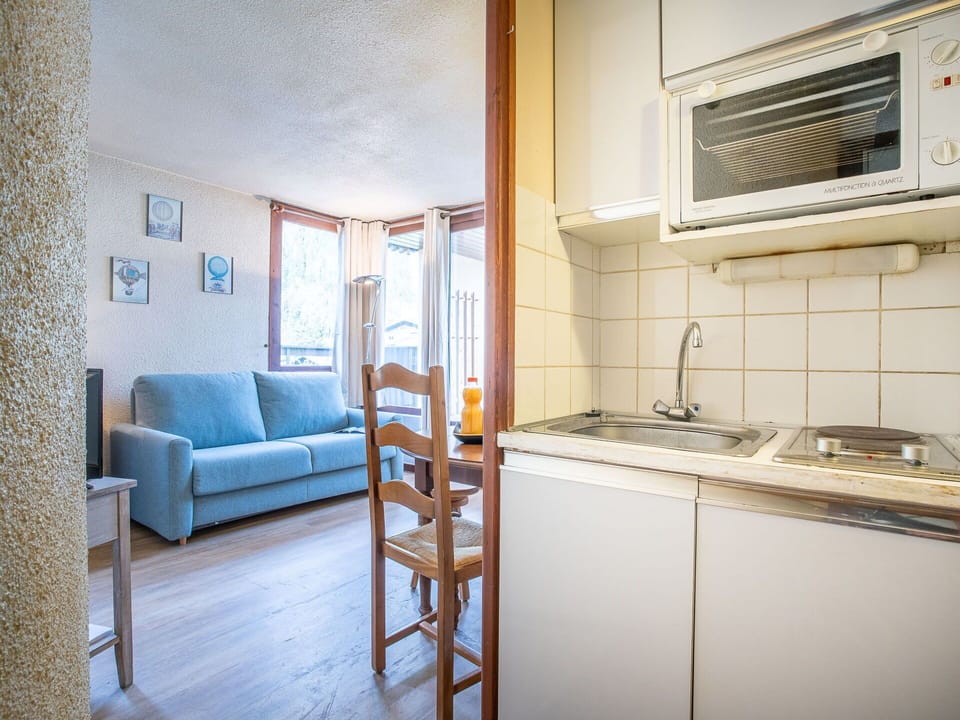 Property, Blue, Sink, Kitchen Appliance, Building, Kitchen Stove, Kitchen Sink, Cabinetry, Countertop, Gas Stove