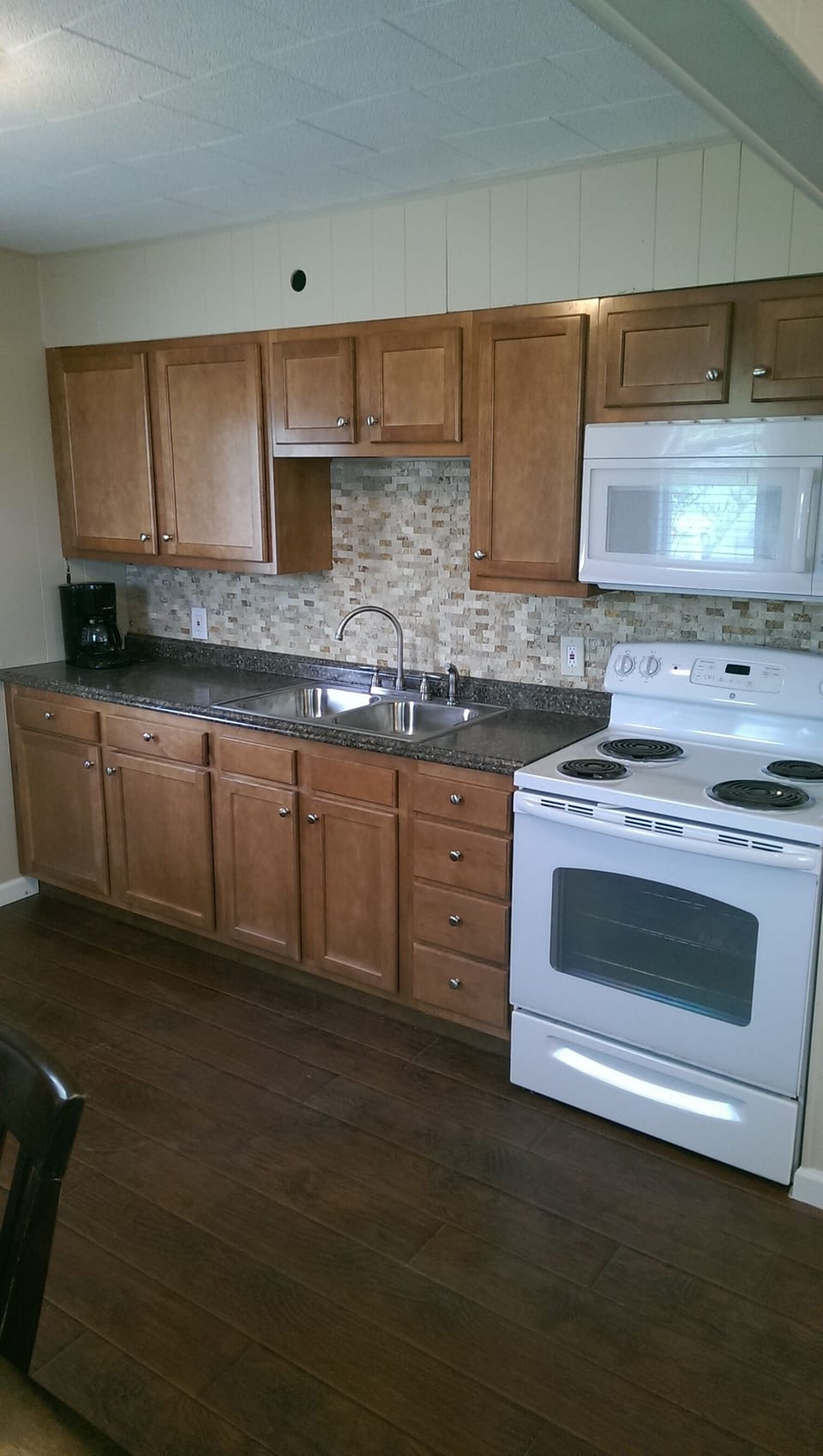 Updated Kitchen with Electric Stove and Microwave, toaster and coffee maker