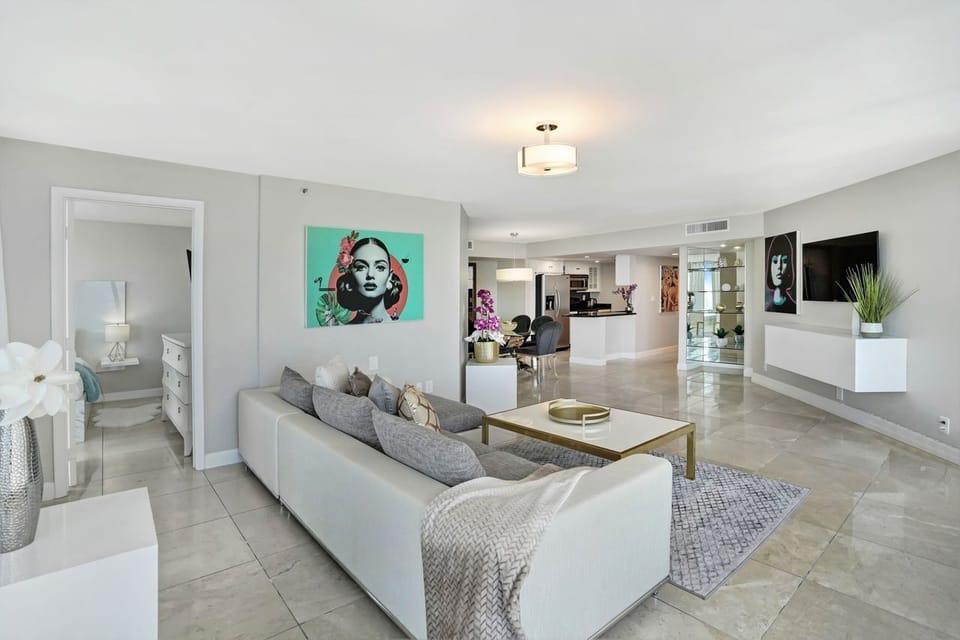 Living room, balcony access, Tv, 2nd master bedroom on left
