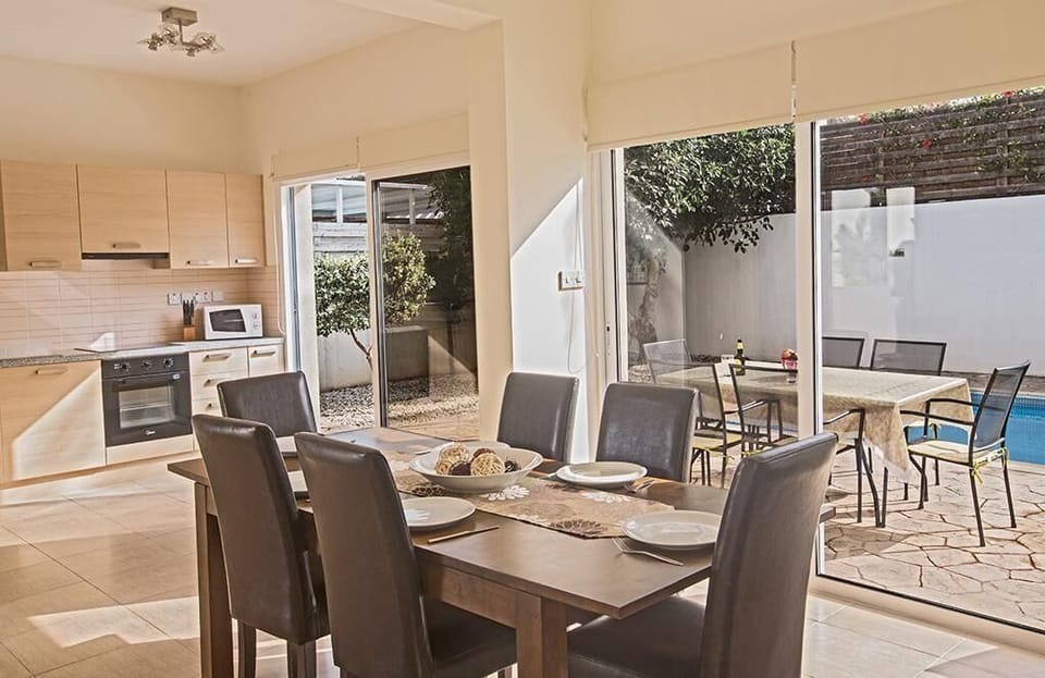 Dining area with table and chairs to seat 6