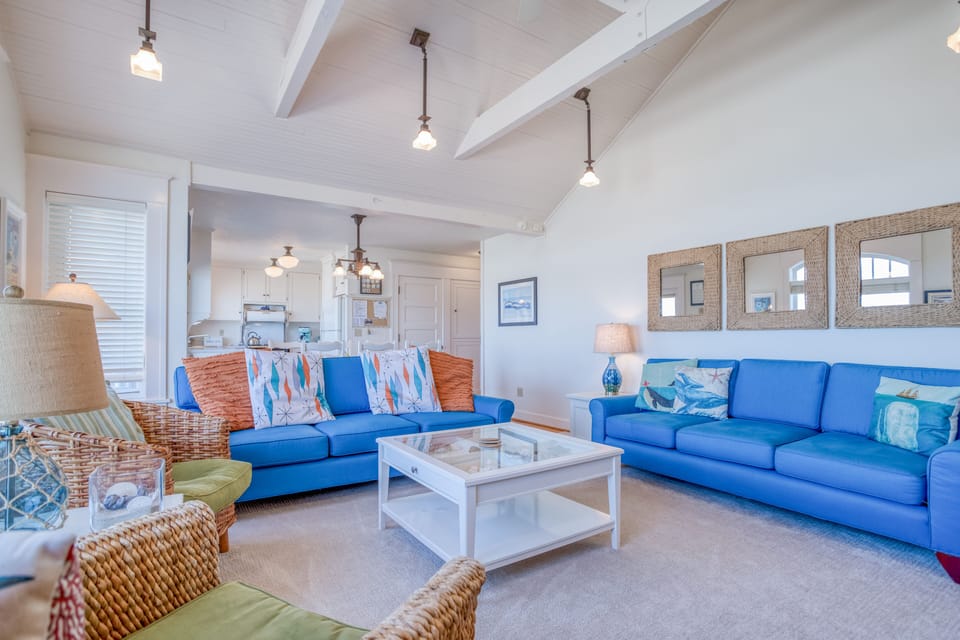 Living Room area with cool blue hues and relaxing vibes