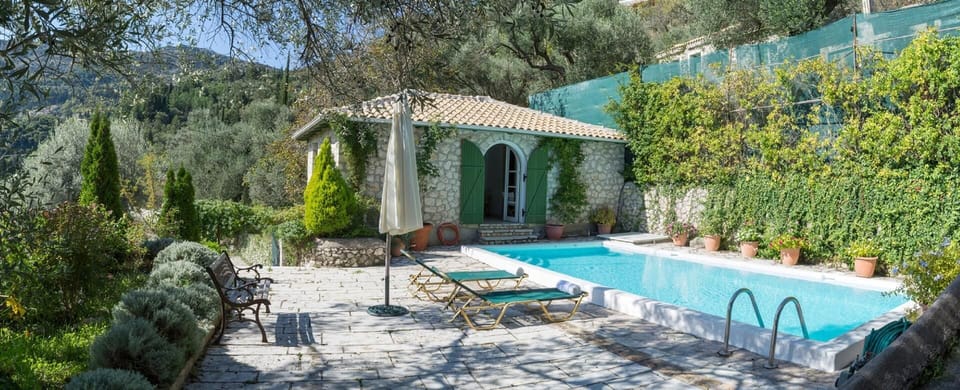 External view of the building. the Guest House & the private pool