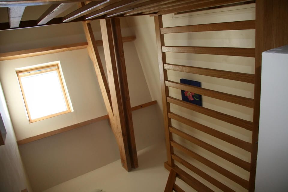 Sleeping area. Staircase