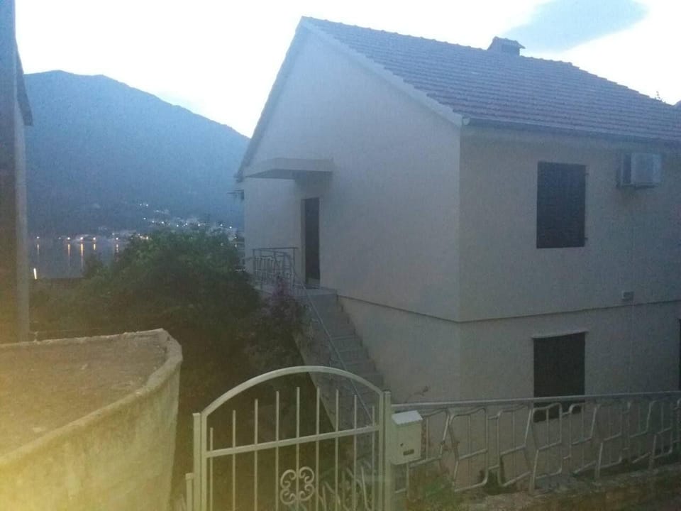 External view of the building. gate (twilight)