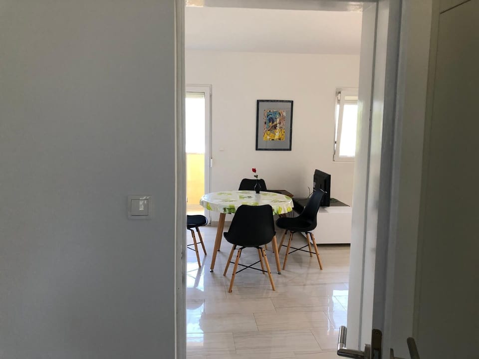 First floor living room with the kitchen-view from bedroom