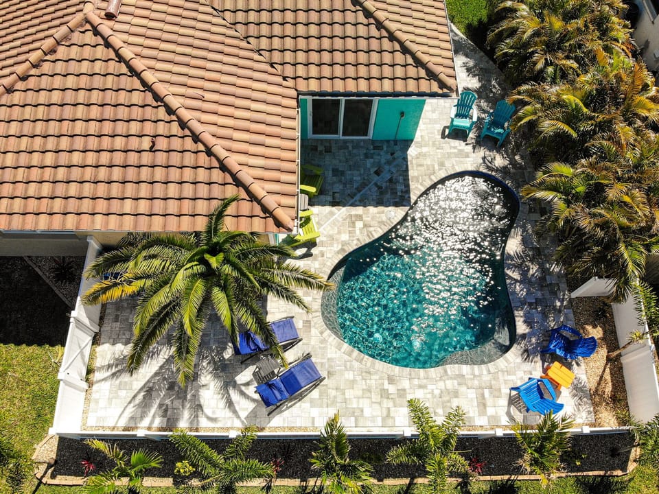 Brand-new heated in ground pool and fenced in backyard. 