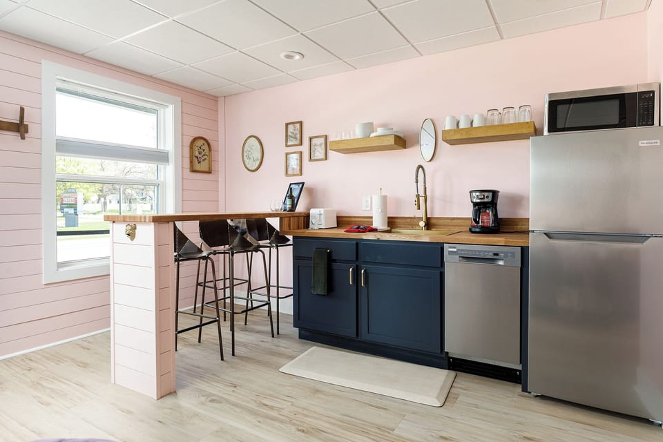 Stylish kitchenette and dining bar for your convenience.