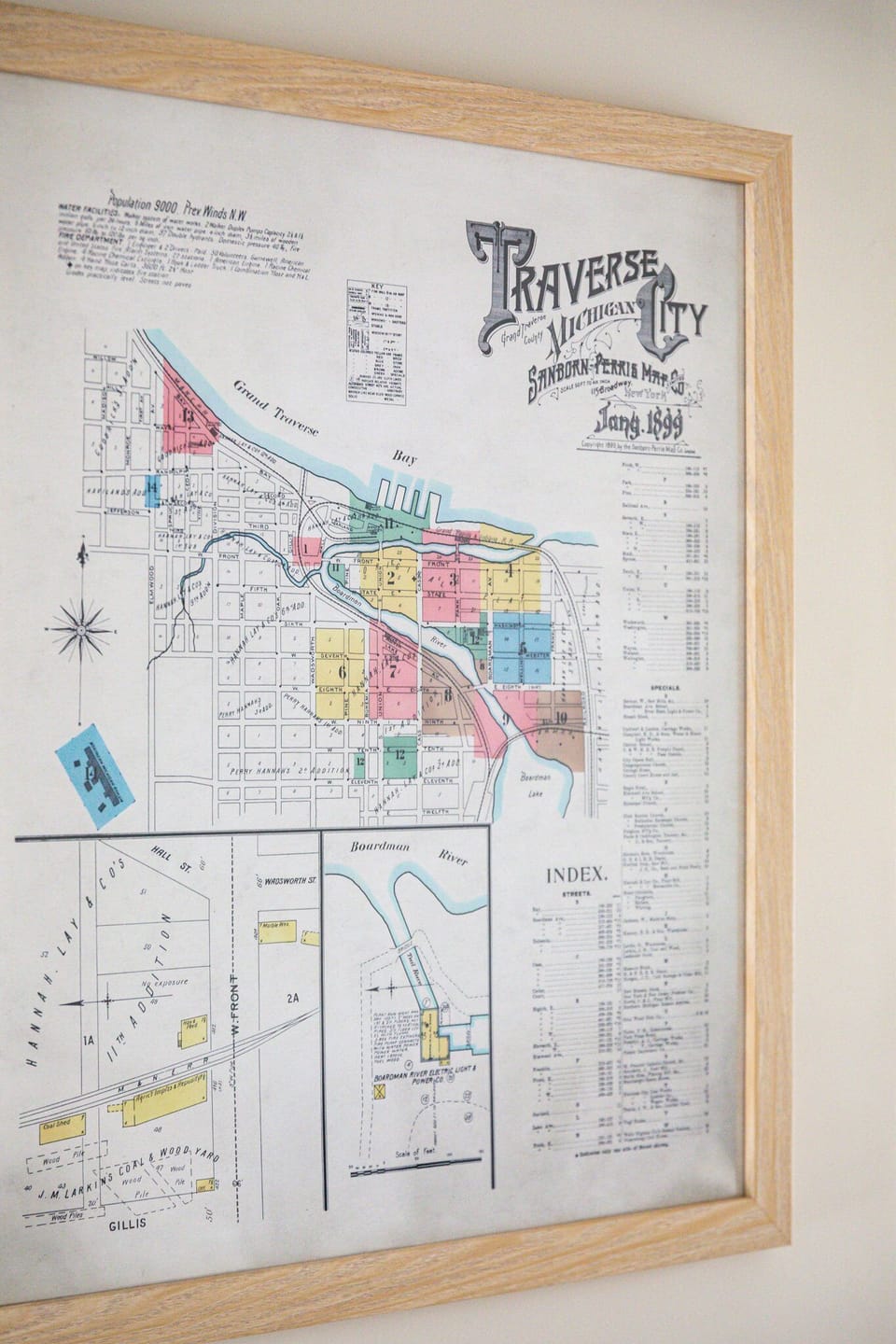 Vintage city map artwork adds character & a local touch to the space.