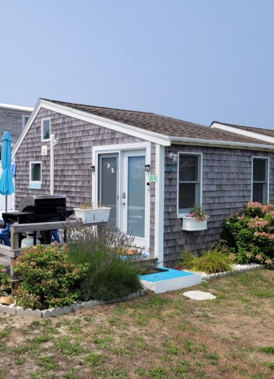 Your own private Beach House surrounded by gardens & steps to beach! 