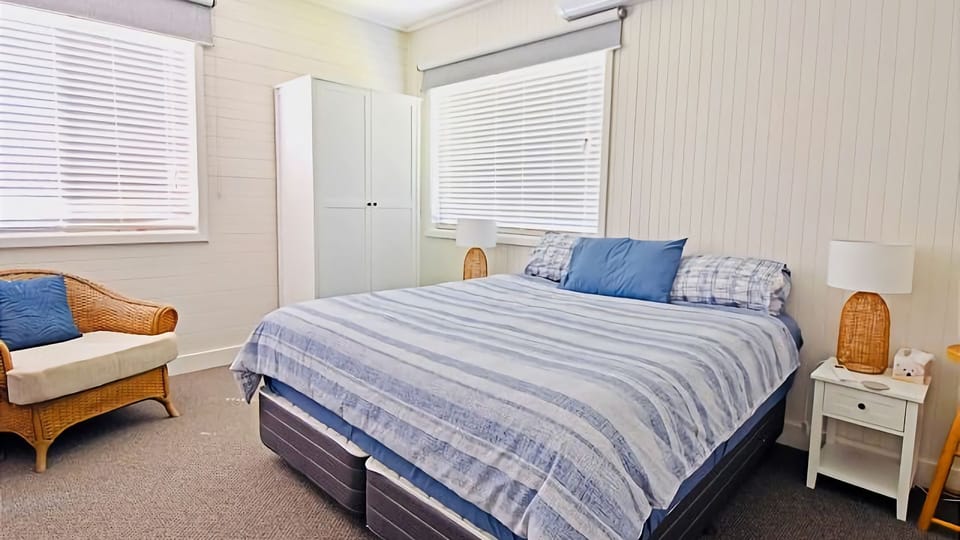 Enjoy a comfortable sleep in this King bed room. 