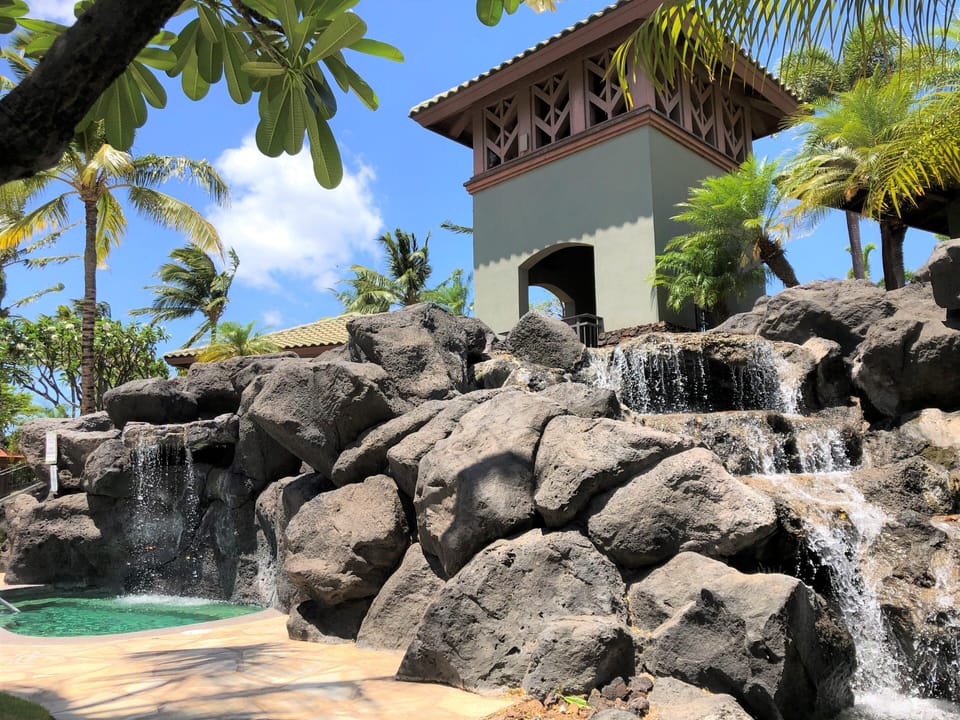 Lava rock hot tub and water falls
