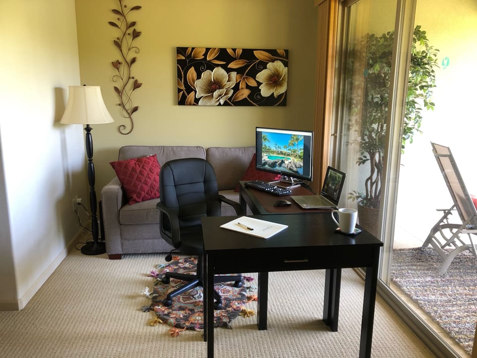 Office set up with extra desk borrowed from guest room adds functionality.