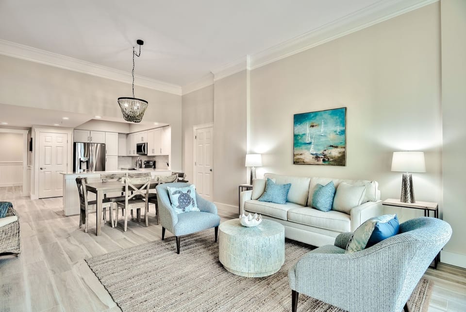 Living room of 201B with an open concept that leads to the kitchen