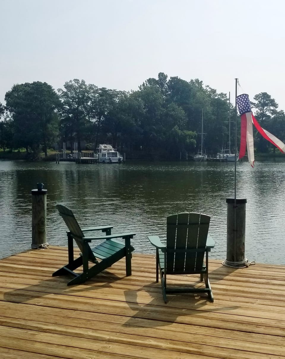 Sip morning coffee on the dock while watching fish and wildlife 
