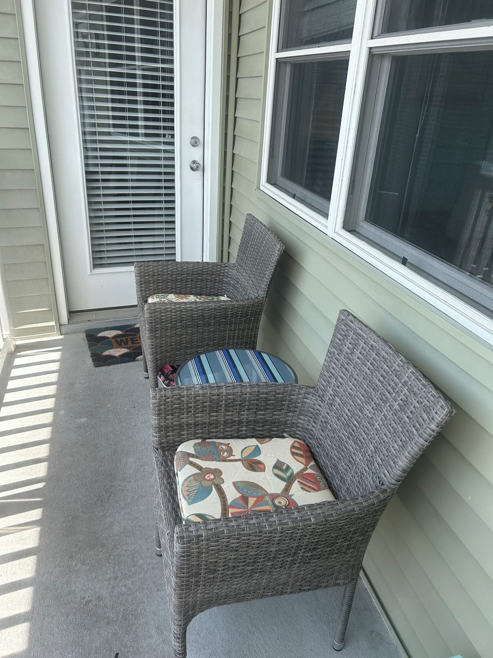 Comfy seating outside unit.
End of walkway = less traffic.