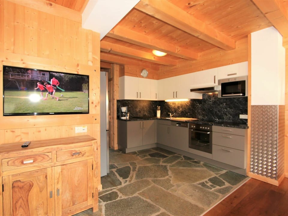 Cabinetry, Furniture, Countertop, Wood, Kitchen, Home Appliance, Interior Design, Lighting, Wood Stain, Kitchen Appliance