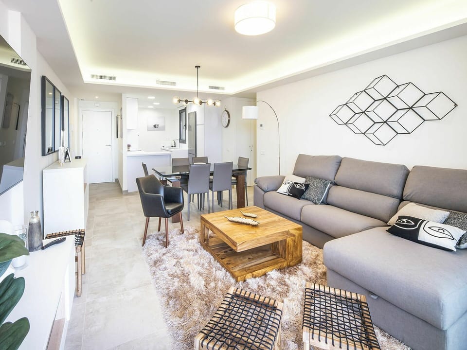 Couch, Table, Furniture, Property, Building, Interior Design, Living Room, Flooring, Architecture, Floor