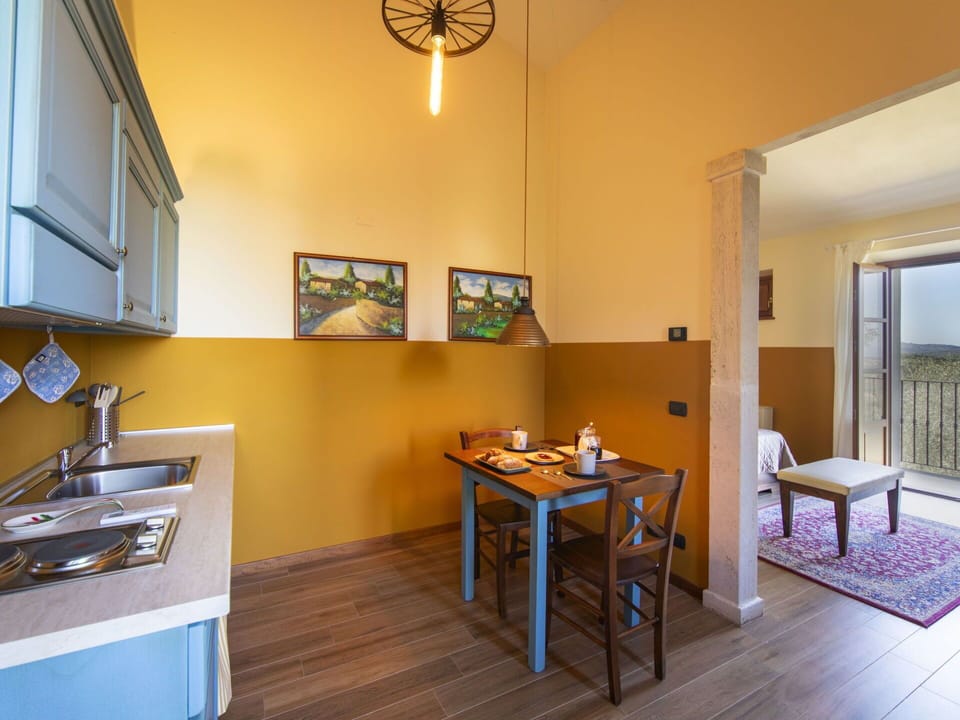 Furniture, Table, Wood, Lighting, Interior Design, Building, Picture Frame, Yellow, House, Gas Stove