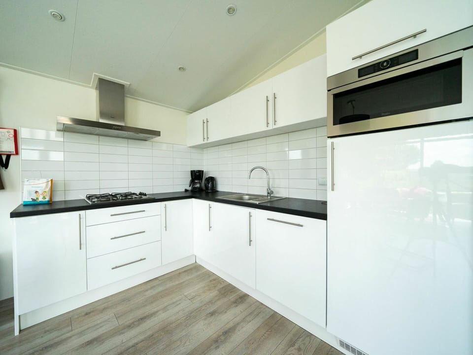 Cabinetry, Countertop, Tap, Sink, Property, Kitchen Sink, Building, Kitchen Stove, Kitchen Appliance, Kitchen