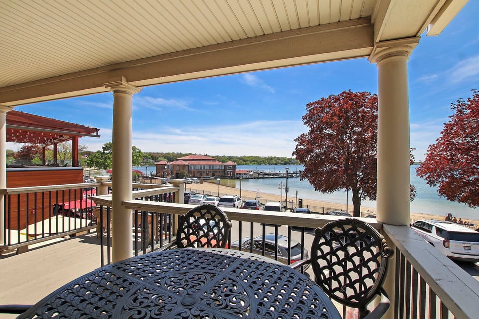 Balcony is located right off the living room. View is Lake Geneva Beach and Riviera
