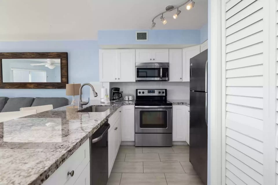 Dishwasher, stove/oven, microwave, refrigerator, coffee pot, toaster, blender
