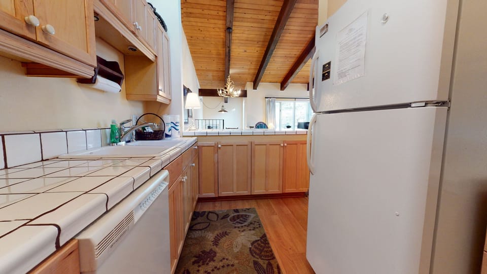 Refrigerator, Flooring, Room, Indoors, Hardwood