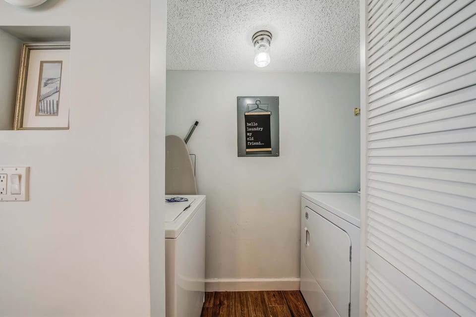 There is also a laundry room with washing machine and dryer inside the unit.