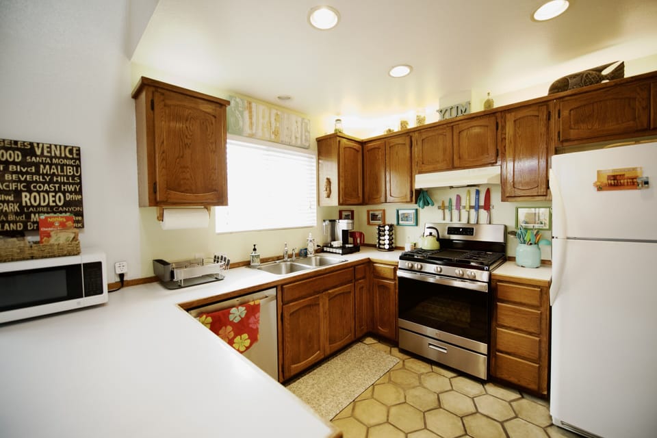 Kitchen with updated stainless steel stove/oven and dishwasher