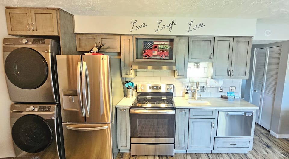 Full sized kitchen with premium stainless steel appliances, cookware, & more!