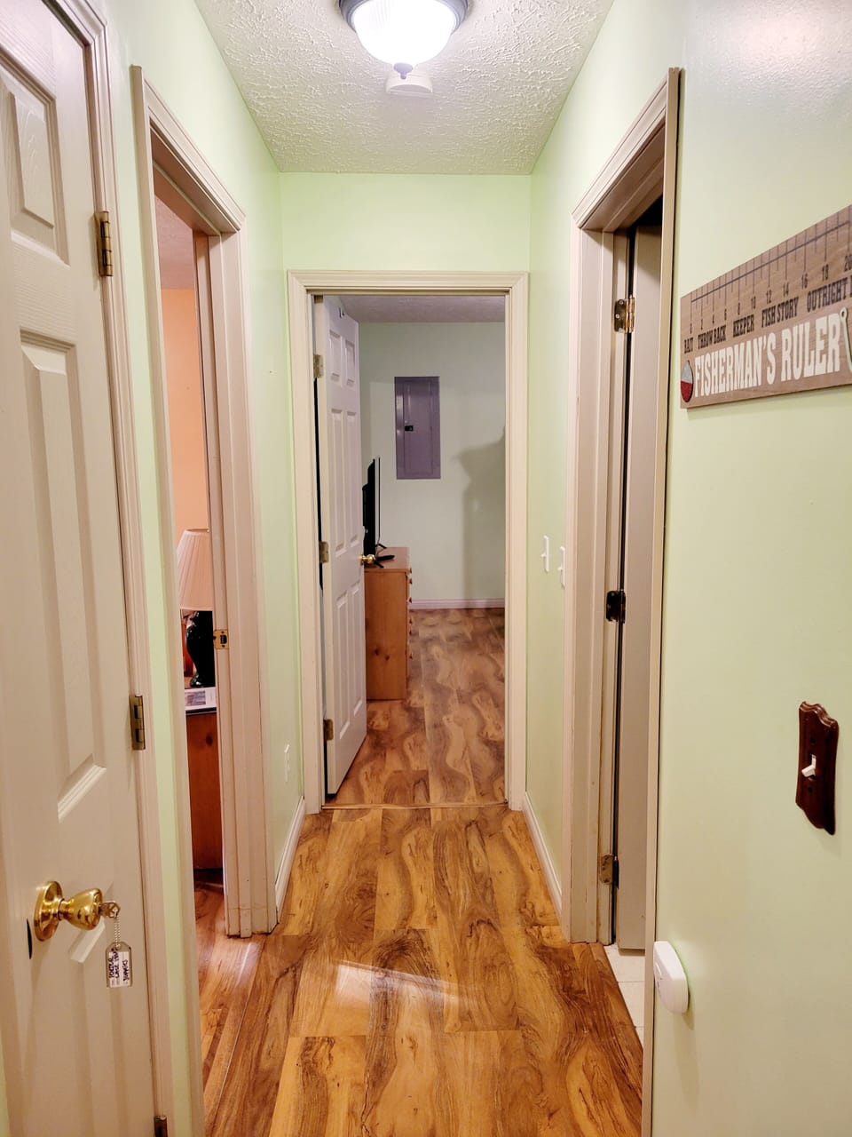 Hallway to bedrooms and bathrooms