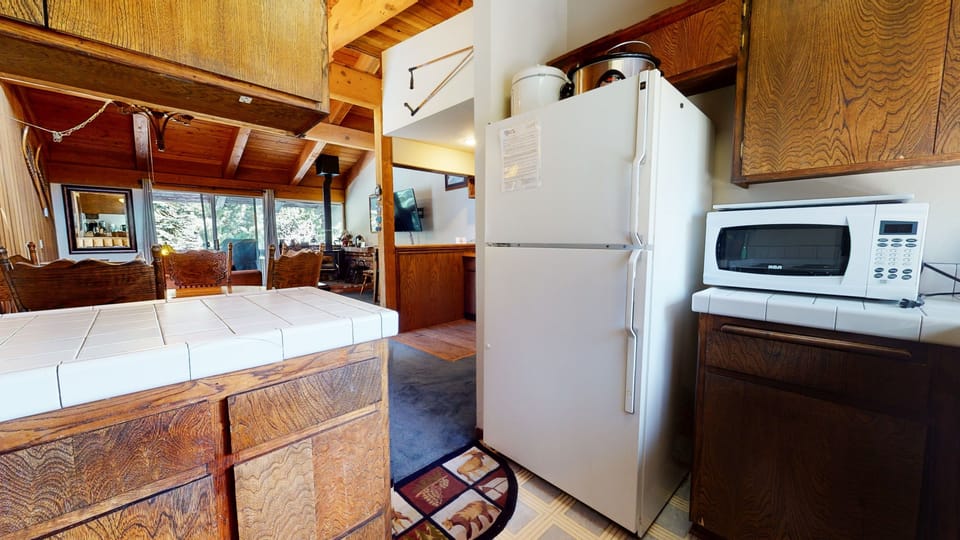 Refrigerator, Indoors, Room, Flooring, Hardwood
