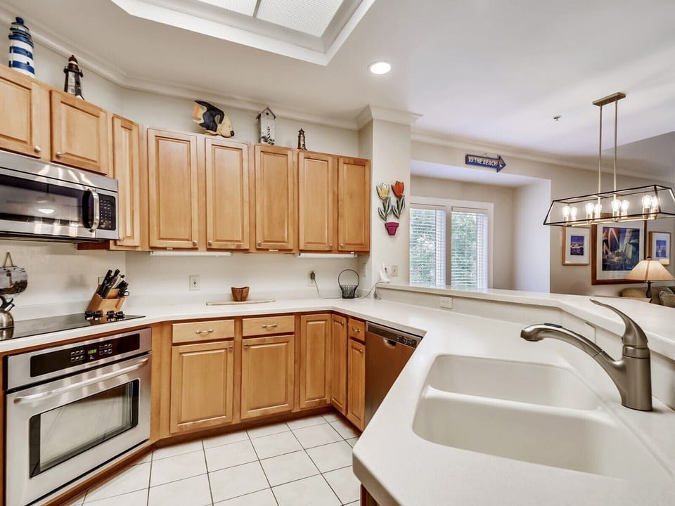 Kitchen with Breakfast Bar at 8122 Wendover Dunes