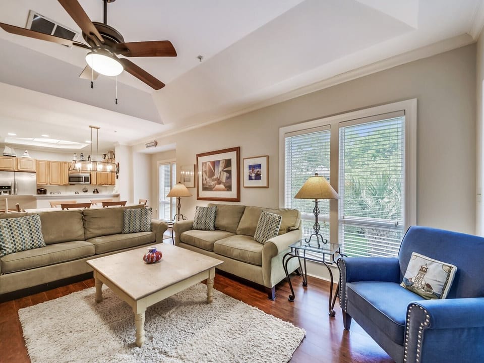 Living Room with Screen Porch Access at 8122 Wendover Dunes