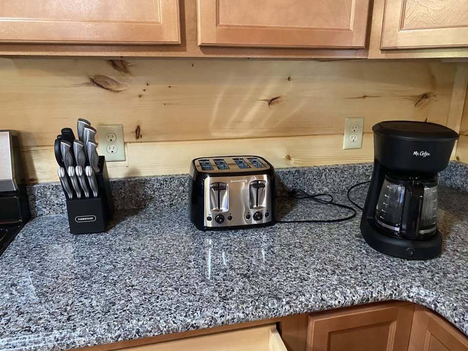Granite counters with stainless appliances.