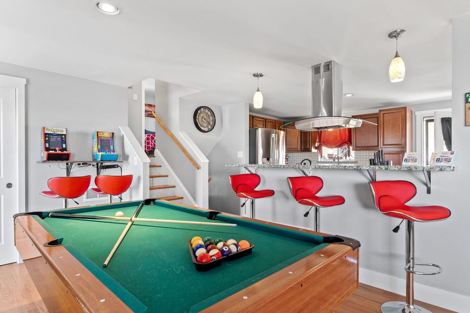 Game Zone Unleashed!  - Your haven of excitement is here, offering a pool table, and arcade games to keep the good times rolling!