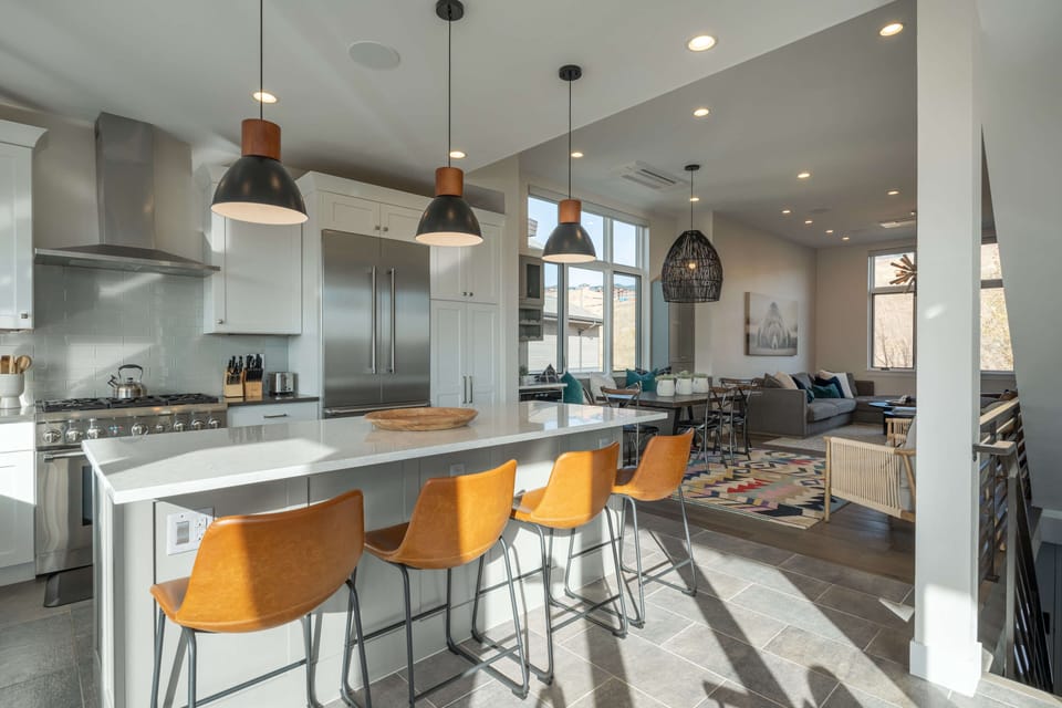 Seating for four at the breakfast bar/kitchen island