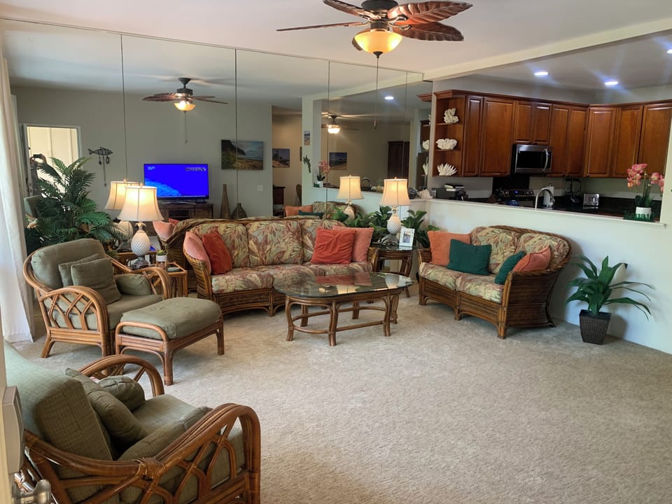 Entrance to spacious open concept condo with authentic Hawaiian furniture.  