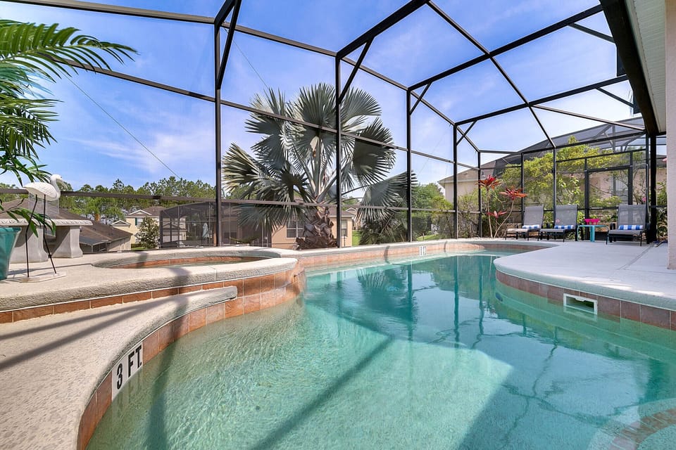 Beautiful private pool deck with sunbathing area plus dining area