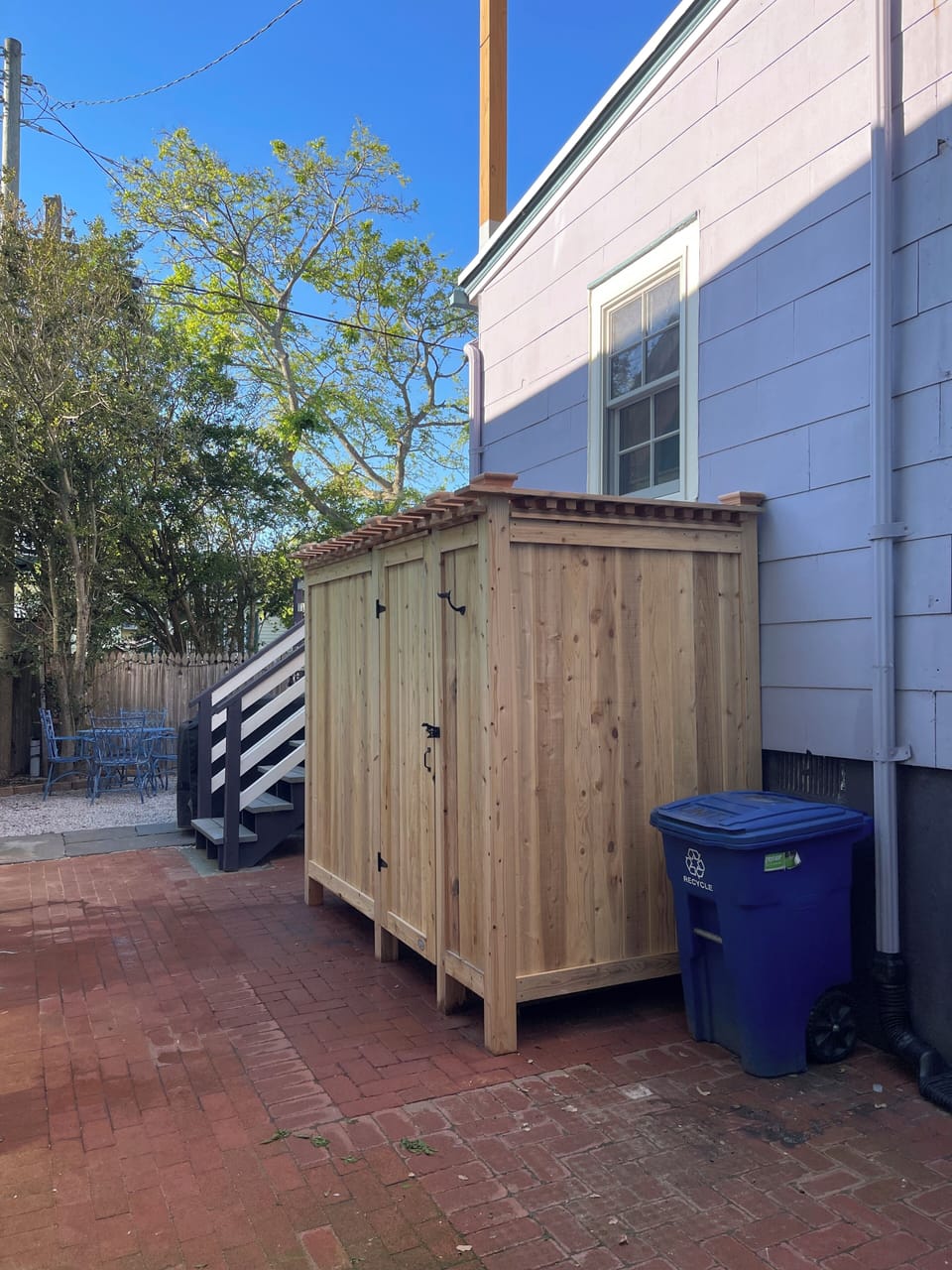 Outdoor shower with changing room.