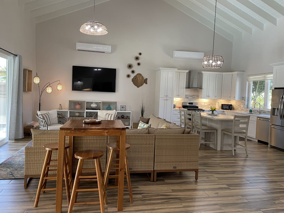 Bar High Top with seating for three overlooking Living Room area
