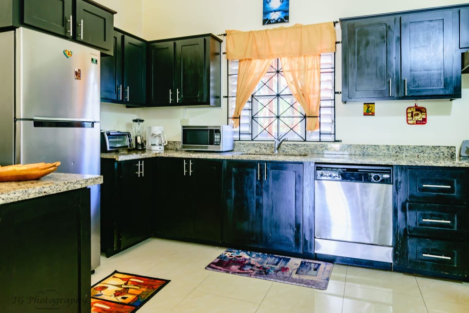 large kitchen with granite countertops