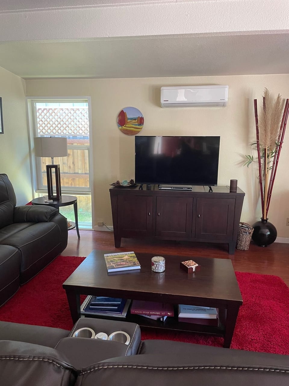 Large sectional sofa with 3 recliners.  Smart TV and AC/Heat.