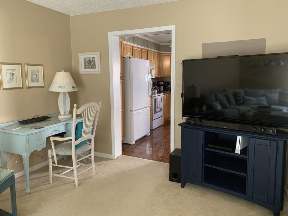 Workspace in the family room; TV with Roku and tons of DVD’s and Wii games 