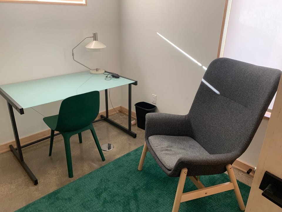 The Lower Level Bedroom 1 has a very comfortable reading corner.